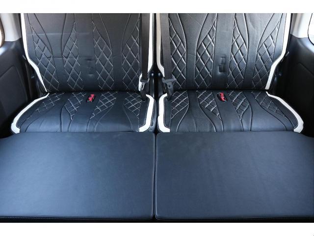 ハイエースワゴン グランドキャビン ファインテックツアラー ベージュ ファインテックツアラー キャプテンシート4脚 オリジナルフロントスポイラー ローダウン BIGXナビ フリップダウン ETC シートカバー ベットキット バルベロ17インチ ナスカータイヤ(10枚目)