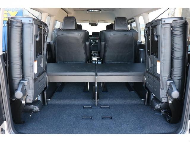 ハイエースワゴン グランドキャビン ファインテックツアラー ベージュ ファインテックツアラー キャプテンシート4脚 オリジナルフロントスポイラー ローダウン BIGXナビ フリップダウン ETC シートカバー ベットキット バルベロ17インチ ナスカータイヤ(18枚目)