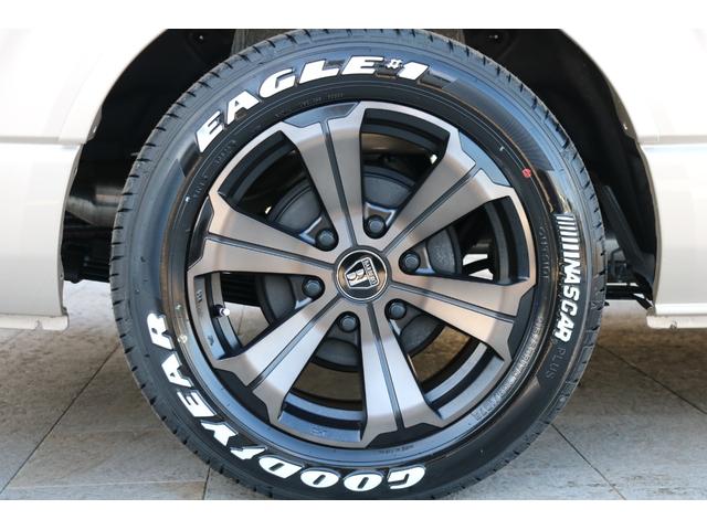 ハイエースワゴン グランドキャビン ファインテックツアラー ベージュ ファインテックツアラー キャプテンシート4脚 オリジナルフロントスポイラー ローダウン BIGXナビ フリップダウン ETC シートカバー ベットキット バルベロ17インチ ナスカータイヤ(48枚目)