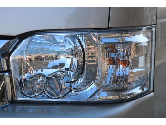 ハイエースワゴン グランドキャビン ファインテックツアラー ベージュ ファインテックツアラー キャプテンシート4脚 オリジナルフロントスポイラー ローダウン BIGXナビ フリップダウン ETC シートカバー ベットキット バルベロ17インチ ナスカータイヤ(49枚目)