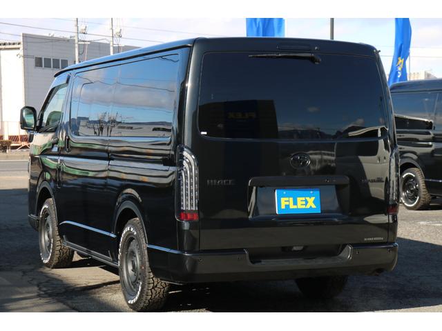 ハイエースバン スーパーＧＬ　ダークプライムＩＩ　ブラックエディションＢＩＧ－Ｘ１１インチナビＥＴＣ２．０ＨＤＭＩポートベッドキットＴフォースフロントスポイラーＲｅフロントグリルオーバーフェンダー煌めきテールＮＣ－１　１６インチアルミダンロップタイヤ（68枚目）