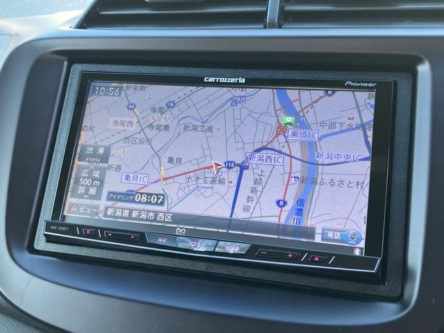 フィット シーズ スマートキー フルセグナビ 14インチAW ETC ドラレコ(SD有り) 専用スマートキー 専用ボディ同色フロントグリル ボディ同色リアガーニッシュ ウインカー付電動格納ドアミラー(5枚目)