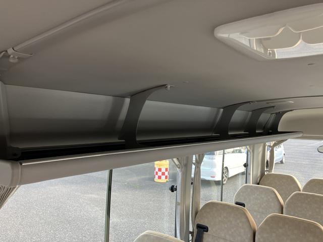 コースター ＬＸ　２５人乗り　オートグライドドア　オートステップ　センタードア（グライドドア・オート）　アクセルインターロック　リアウインドウデフォッガー　ルームラック（トレイタイプ・運転席側）　カーテン（26枚目）