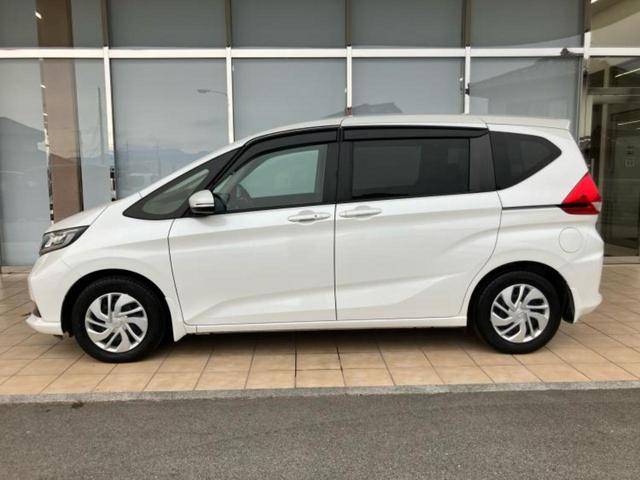 フリード Gホンダセンシング 新品タイヤ/保証書/純正 SDナビ/衝突安全装置/両側電動スライドドア/シートヒーター 前席/車線逸脱防止支援システム/ドライブレコーダー 社外/ヘッドランプ LED/USBジャック バックカメラ(2枚目)