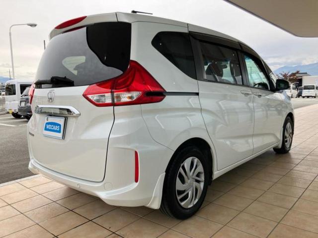 フリード Gホンダセンシング 新品タイヤ/保証書/純正 SDナビ/衝突安全装置/両側電動スライドドア/シートヒーター 前席/車線逸脱防止支援システム/ドライブレコーダー 社外/ヘッドランプ LED/USBジャック バックカメラ(3枚目)