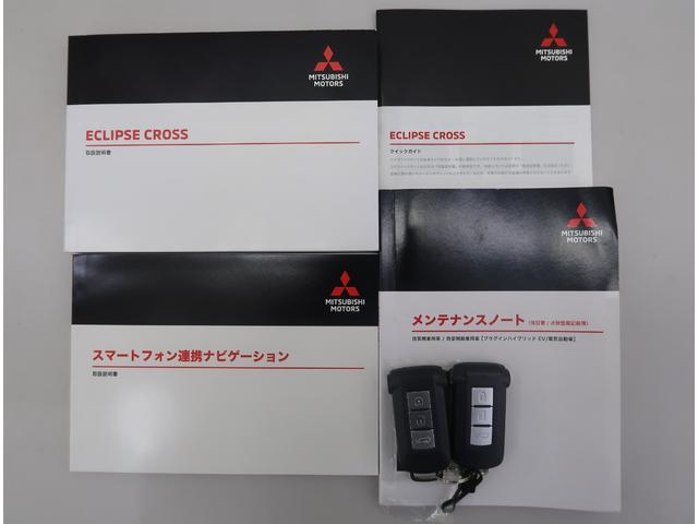 エクリプスクロスPHEV P 禁煙車 社有車UP 電動リヤゲート スマホ連携ナビ 全方位カメラ マイパイロット ステアリングリモコン ハンドルヒーター シートヒーター 運転席電動シート USBポート AC1500W ブラック内装(19枚目)