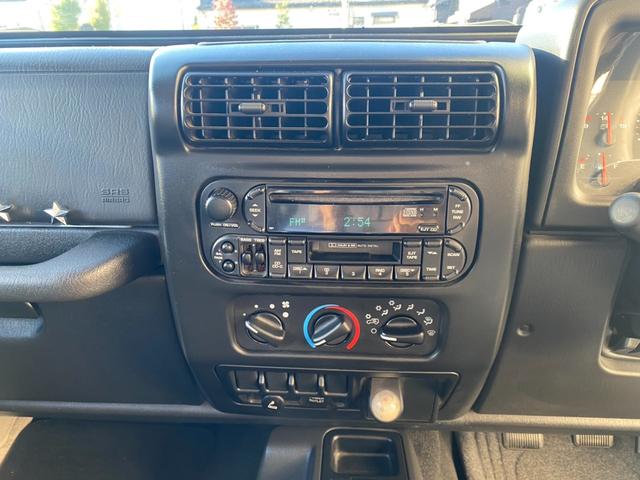 ジープ・ラングラー スポーツ 4000cc 5MT エアコン パワステ 純正オーディオ カスタム車両 プロコンプ ウォーン ダブルカルダン(30枚目)