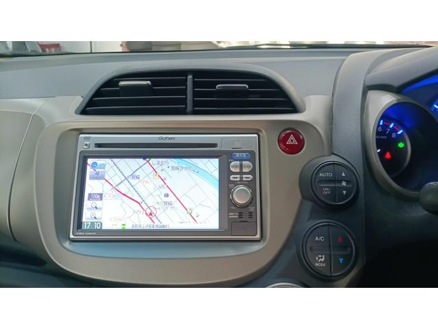 フィットハイブリッド スマートセレクション　車検整備付き　ナビ　ワンセグＴＶ　バックカメラ　ＣＤ／ＤＶＤ　ＥＴＣ　クルーズコントロール　フルフラット　アイドリングストップ　盗難防止システム　スマートキー　ＡＢＳ　横滑り防止　オートエアコン（15枚目）