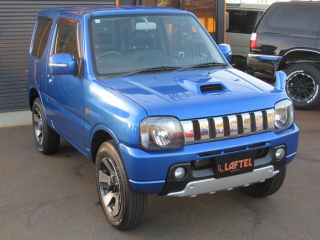 ジムニー クロスアドベンチャーXC 特別仕様車 4WD ターボ 純正16インチAW シートヒーター SDナビ バニティミラー レベライザー(3枚目)