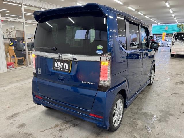 N-BOXカスタム G・Lパッケージ/下取直販車/23年製夏タイヤ/禁煙車 冬タイヤ付/片側自動スライドドア/純正7インチナビ/ワンセグ/ETC/バックカメラ/LEDライト/CD/DVD/オートライト/保証・取説あり/スペアキー/リアスポイラー/フォグランプ(2枚目)