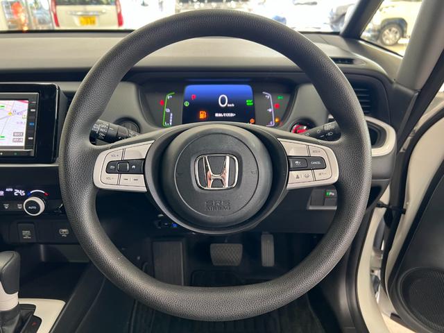 フィット e:HEVベーシック 禁煙車/岡山県仕入/衝突軽減ブレーキ ブレーキホールド/車線逸脱/コーナーセンサー/純正7型ナビ/CD/ブルートゥース/USB/ETC/バックカメラ/オートライト/LEDヘッドライト/レーダークルーズ/取説/保証書/スペアキー有(33枚目)