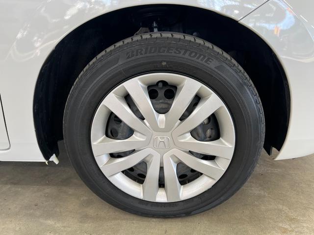 フィット e:HEVベーシック 禁煙車/岡山県仕入/衝突軽減ブレーキ ブレーキホールド/車線逸脱/コーナーセンサー/純正7型ナビ/CD/ブルートゥース/USB/ETC/バックカメラ/オートライト/LEDヘッドライト/レーダークルーズ/取説/保証書/スペアキー有(53枚目)