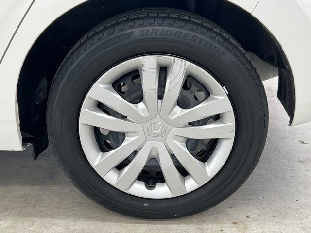 フィット e:HEVベーシック 禁煙車/岡山県仕入/衝突軽減ブレーキ ブレーキホールド/車線逸脱/コーナーセンサー/純正7型ナビ/CD/ブルートゥース/USB/ETC/バックカメラ/オートライト/LEDヘッドライト/レーダークルーズ/取説/保証書/スペアキー有(55枚目)