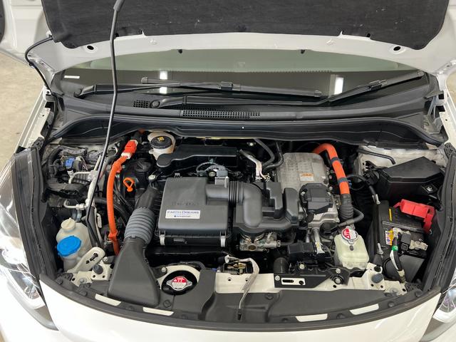 フィット e:HEVベーシック 禁煙車/岡山県仕入/衝突軽減ブレーキ ブレーキホールド/車線逸脱/コーナーセンサー/純正7型ナビ/CD/ブルートゥース/USB/ETC/バックカメラ/オートライト/LEDヘッドライト/レーダークルーズ/取説/保証書/スペアキー有(57枚目)