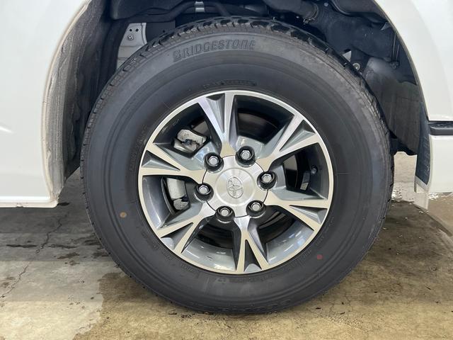 ハイエースバン スーパーＧＬ　ダークプライムＩＩ／４ＷＤ／愛知仕入／禁煙車／　１オーナー／特別仕様車／１００Ｖ電源／Ｄインナーミラー／メモリーナビ／ブルートゥース／衝突軽減＆車線逸脱警告／コーナーセンサー／オートハイビーム／ハーフレザー／ウッドコンビステア／両側電動スライド（57枚目）