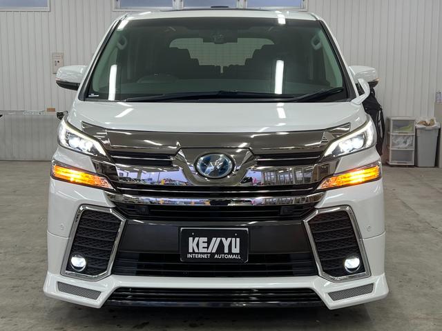 ヴェルファイアハイブリッド ZR 禁煙車/22年製冬タイヤ/ツインサンルーフ アドミレーションフルエアロ/アドミレーションマフラー/アルパイン10型ナビ&フリップダウン/ブルートゥース/Bカメラ/衝突軽減/車線逸脱/前後ドラレコ/電動ハーフレザーシート/取説/記録簿/スペアキー(21枚目)