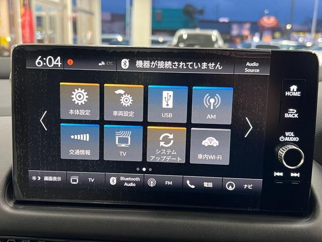 ｅ：ＨＥＶ　Ｚ　登録済未使用車　ホンダセンシング　ＢＯＺＥプレミアムサウンド　９インチディスプレイオーディオ　ナビ　フルセグ　ブルートゥース　全方位カメラ　ＥＴＣ２．０　電動レザーシート　ワイパー熱線(35枚目)