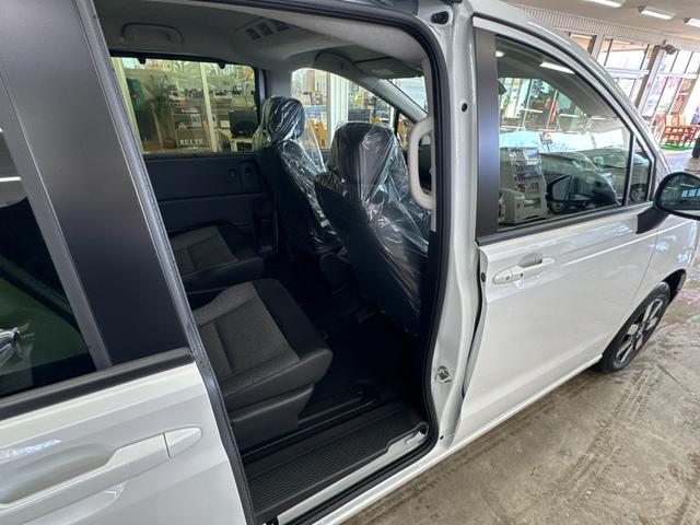 フリード ｅ：ＨＥＶエアー　ＥＸ／４ＷＤ／登録済み未使用車／　寒冷地仕様／純正Ｇａｔｈｅｒｓ１１．４型／全方位カメラ／ＢＳＭ／ＥＴＣ２．０／ブルートゥース／フルセグ／ＤＶＤ／シートヒーター／コーナーセンサー／ブレーキホールド／ワイパー熱線＆ドアミラーヒーター（27枚目）