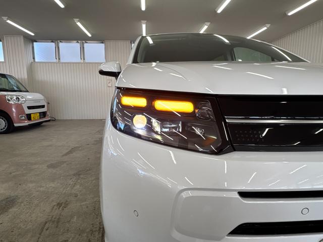 フリード ｅ：ＨＥＶエアー　ＥＸ／４ＷＤ／登録済み未使用車／　寒冷地仕様／純正Ｇａｔｈｅｒｓ１１．４型／全方位カメラ／ＢＳＭ／ＥＴＣ２．０／ブルートゥース／フルセグ／ＤＶＤ／シートヒーター／コーナーセンサー／ブレーキホールド／ワイパー熱線＆ドアミラーヒーター（53枚目）