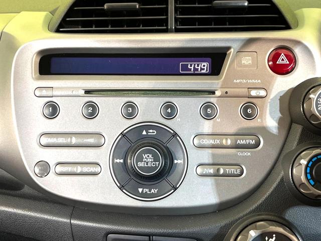 フィット Ｇ　禁煙車　ＥＴＣ　エアコン　オーディオ　ＣＤ再生　電動格納ミラー　衝突安全ボディ　プライバシーガラス　パワーウィンドウ　パワーステアリング（4枚目）