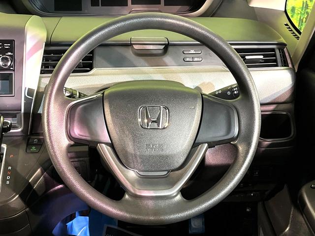 フリード+ G 4WD 電動スライド ETC シートヒーター オートエアコン オーディオ CD再生 スマートキー 盗難防止装置 横滑り防止装置 電動格納ミラー アイドリングストップ ヘッドライトレベライザー(11枚目)