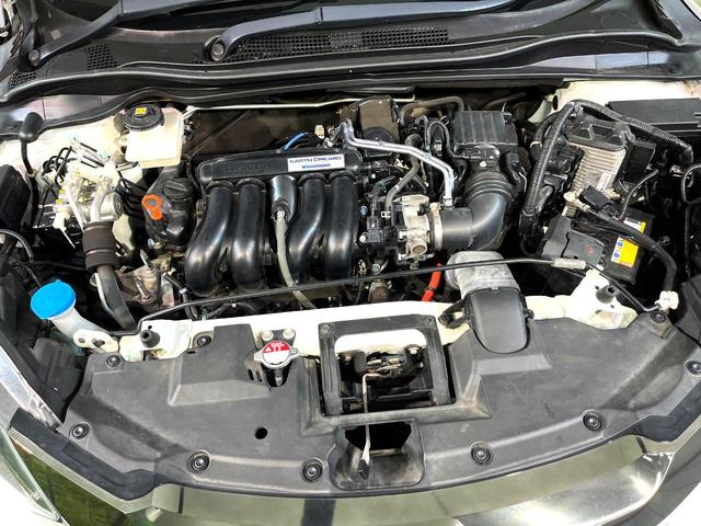 ヴェゼル ハイブリッドＺ・ホンダセンシング　純正８型ナビ　寒冷地仕様　バックカメラ　衝突被害軽減システム　レーダークルーズ　禁煙車　ハーフレザーシート　ドラレコ　ＬＥＤヘッド　ルーフレール　ビルトインＥＴＣ　オートハイビーム　車線逸脱警報（18枚目）