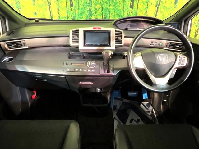 フリードスパイクハイブリッド ジャストセレクション 両側電動ドア SDナビ バックカメラ 禁煙車 ハーフレザーシート ドラレコ スマートキー HIDヘッド ETC クルコン オートエアコン 純正15インチアルミ 地デジ 横滑り防止装置(2枚目)