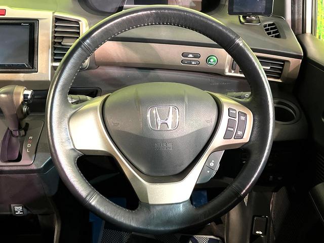 フリードスパイクハイブリッド ジャストセレクション 両側電動ドア SDナビ バックカメラ 禁煙車 ハーフレザーシート ドラレコ スマートキー HIDヘッド ETC クルコン オートエアコン 純正15インチアルミ 地デジ 横滑り防止装置(11枚目)