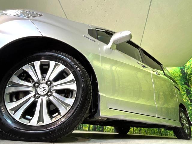 フリードスパイクハイブリッド ジャストセレクション 両側電動ドア SDナビ バックカメラ 禁煙車 ハーフレザーシート ドラレコ スマートキー HIDヘッド ETC クルコン オートエアコン 純正15インチアルミ 地デジ 横滑り防止装置(13枚目)