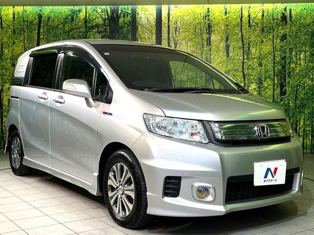 フリードスパイクハイブリッド ジャストセレクション 両側電動ドア SDナビ バックカメラ 禁煙車 ハーフレザーシート ドラレコ スマートキー HIDヘッド ETC クルコン オートエアコン 純正15インチアルミ 地デジ 横滑り防止装置(16枚目)