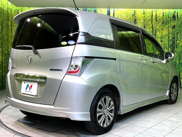 フリードスパイクハイブリッド ジャストセレクション 両側電動ドア SDナビ バックカメラ 禁煙車 ハーフレザーシート ドラレコ スマートキー HIDヘッド ETC クルコン オートエアコン 純正15インチアルミ 地デジ 横滑り防止装置(17枚目)