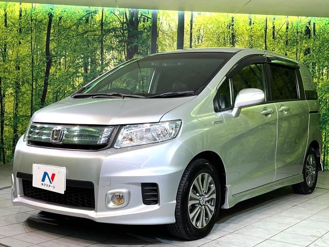 フリードスパイクハイブリッド ジャストセレクション 両側電動ドア SDナビ バックカメラ 禁煙車 ハーフレザーシート ドラレコ スマートキー HIDヘッド ETC クルコン オートエアコン 純正15インチアルミ 地デジ 横滑り防止装置(50枚目)