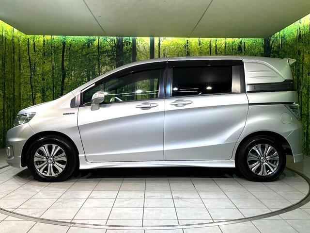 フリードスパイクハイブリッド ジャストセレクション 両側電動ドア SDナビ バックカメラ 禁煙車 ハーフレザーシート ドラレコ スマートキー HIDヘッド ETC クルコン オートエアコン 純正15インチアルミ 地デジ 横滑り防止装置(51枚目)