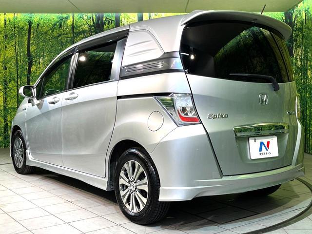 フリードスパイクハイブリッド ジャストセレクション 両側電動ドア SDナビ バックカメラ 禁煙車 ハーフレザーシート ドラレコ スマートキー HIDヘッド ETC クルコン オートエアコン 純正15インチアルミ 地デジ 横滑り防止装置(52枚目)