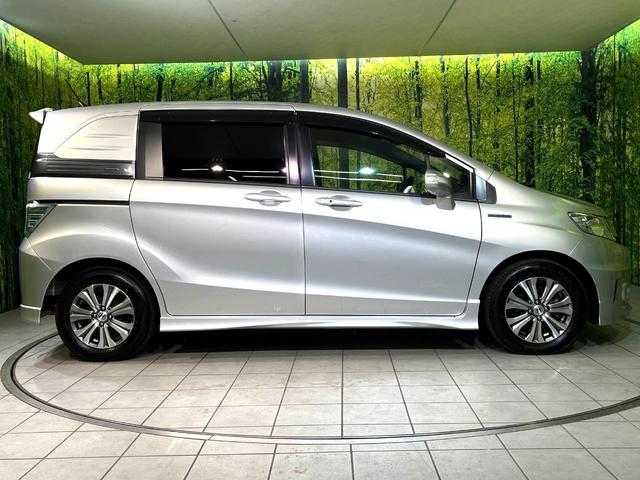 フリードスパイクハイブリッド ジャストセレクション 両側電動ドア SDナビ バックカメラ 禁煙車 ハーフレザーシート ドラレコ スマートキー HIDヘッド ETC クルコン オートエアコン 純正15インチアルミ 地デジ 横滑り防止装置(53枚目)