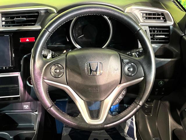 フィットハイブリッド Sパッケージ 4WD 衝突軽減 ナビ バックカメラ LEDヘッド ETC クルコン オートライト オートエアコン Bluetooth接続 CD/DVD再生 フルセグ 禁煙車 ドラレコ スマートキー(11枚目)