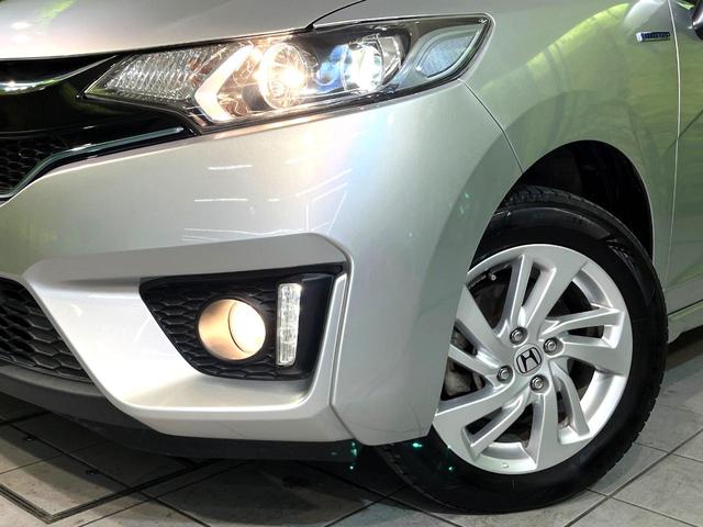 フィットハイブリッド Sパッケージ 4WD 衝突軽減 ナビ バックカメラ LEDヘッド ETC クルコン オートライト オートエアコン Bluetooth接続 CD/DVD再生 フルセグ 禁煙車 ドラレコ スマートキー(12枚目)
