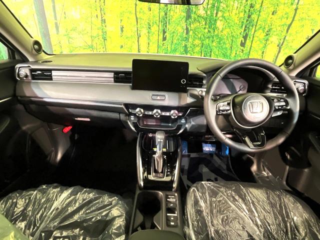 ヴェゼル e:HEV Z 登録済未使用車 純正ナビ 全周囲カメラ ホンダセンシング レーダークルーズ ハーフレザーシート コーナーセンサー スマートキー LEDヘッド ETC2.0 車線逸脱警報 オートライト デュアルエアコン(2枚目)