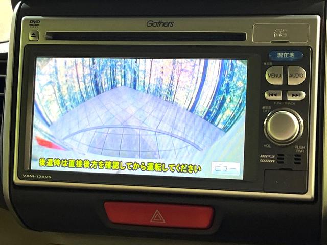 N-BOX G・ターボパッケージ ターボ 純正ナビ バックカメラ 両側電動スライド クルコン ETC HIDヘッド オートライト オートエアコン スマートキー プッシュスタート 革巻きステアリング パドルシフト アイドリングストップ(4枚目)