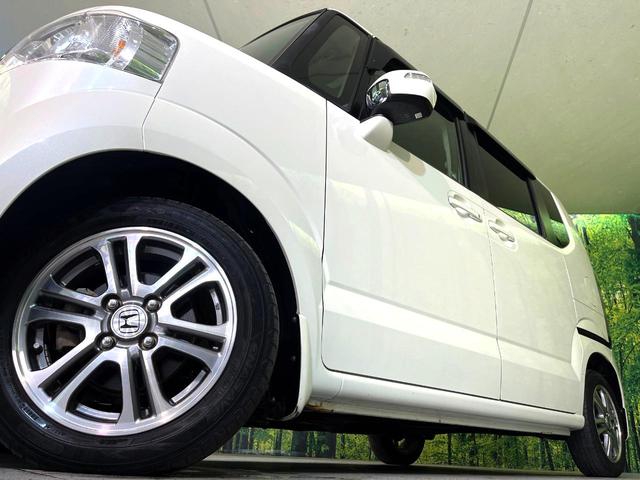 N-BOX G・ターボパッケージ ターボ 純正ナビ バックカメラ 両側電動スライド クルコン ETC HIDヘッド オートライト オートエアコン スマートキー プッシュスタート 革巻きステアリング パドルシフト アイドリングストップ(13枚目)