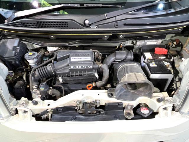 N-BOX G・ターボパッケージ ターボ 純正ナビ バックカメラ 両側電動スライド クルコン ETC HIDヘッド オートライト オートエアコン スマートキー プッシュスタート 革巻きステアリング パドルシフト アイドリングストップ(18枚目)