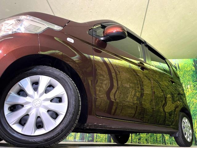 N-WGN G 衝突軽減 純正オーディオ CD再生 オートエアコン スマートキー 盗難防止装置 電動格納ミラー 横滑り防止装置 ヘッドライトレベライサー プライバシーガラス(13枚目)