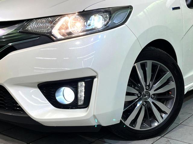 フィットハイブリッド Sパッケージ 純正ナビ バックカメラ 禁煙車 スマートキー LEDヘッド ビルトインETC クルコン オートライト オートエアコン 純正16インチアルミ Bluetooth CD DVD再生 地デジ(12枚目)