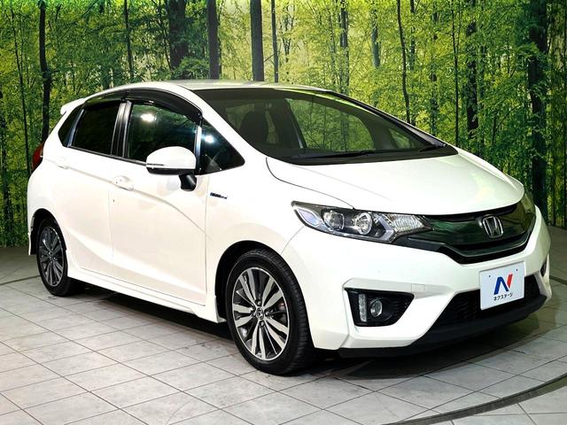 フィットハイブリッド Sパッケージ 純正ナビ バックカメラ 禁煙車 スマートキー LEDヘッド ビルトインETC クルコン オートライト オートエアコン 純正16インチアルミ Bluetooth CD DVD再生 地デジ(16枚目)