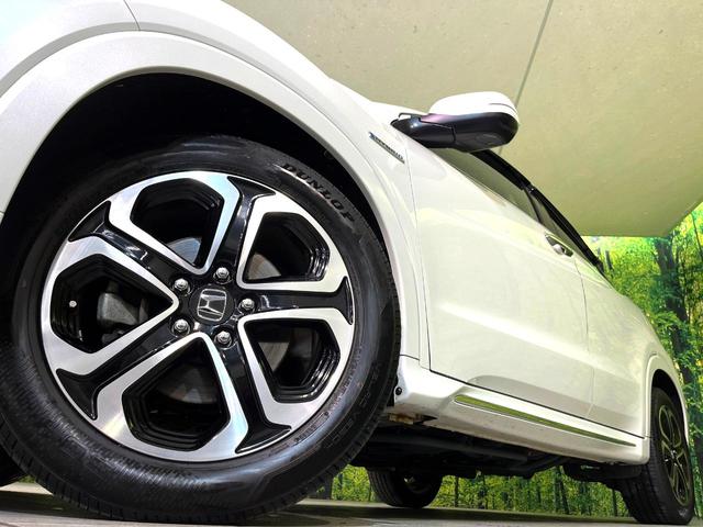 ヴェゼル ハイブリッドＺ・ホンダセンシング　４ＷＤ　衝突軽減　純正ナビ　シートヒーター　ＬＥＤヘッド　バックカメラ　ＥＴＣ　Ｂｌｕｅｔｏｏｔｈ接続　ＣＤ／ＤＶＤ再生　オートライト　オートエアコン　スマートキー　盗難防止装置　電動格納ミラー（13枚目）