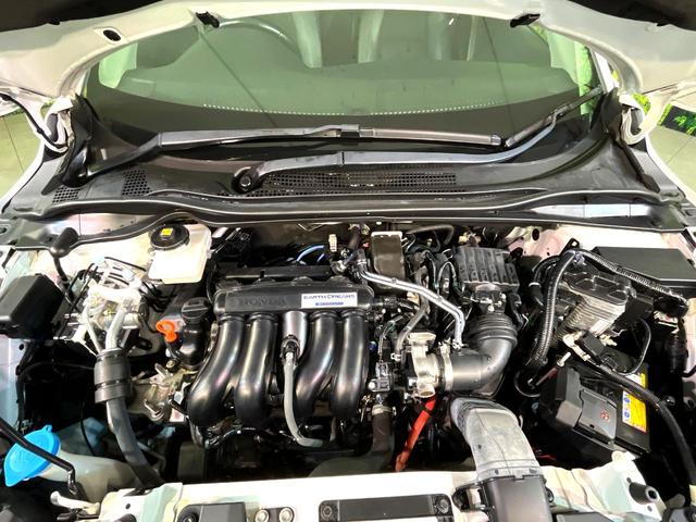 ヴェゼル ハイブリッドＺ・ホンダセンシング　４ＷＤ　衝突軽減　純正ナビ　シートヒーター　ＬＥＤヘッド　バックカメラ　ＥＴＣ　Ｂｌｕｅｔｏｏｔｈ接続　ＣＤ／ＤＶＤ再生　オートライト　オートエアコン　スマートキー　盗難防止装置　電動格納ミラー（18枚目）