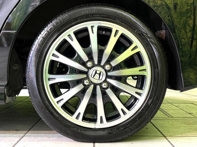 N-BOXカスタム G・ターボAパッケージ 4WD 衝突軽減 ナビ 両側電動スライド バックカメラ HIDヘッド CD/DVD再生 オートエアコン ETC クルーズコントロール スマートキー 盗難防止装置 電動格納ミラー 横滑り防止装置(55枚目)