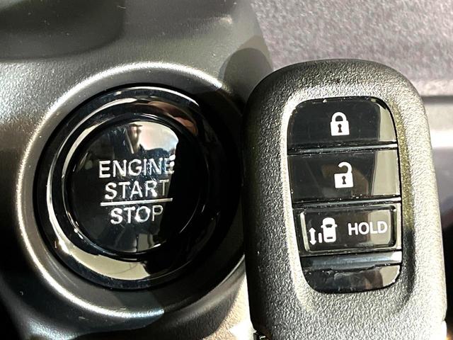 Ｎ－ＢＯＸカスタム ベースグレード　４ＷＤ　届出済未使用車　電動スライドドア　シートヒーター　ＬＥＤヘッド　オートブレーキホールド　オートエアコン　スマートキー　盗難防止装置　横滑り防止装置　電動格納ミラー　プライバシーガラス（7枚目）