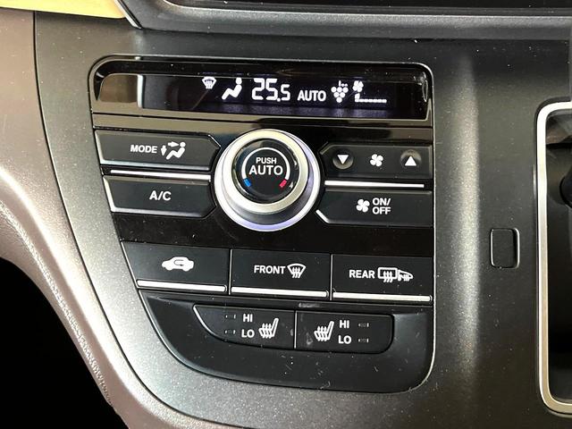 フリード Ｇ・ホンダセンシング　４ＷＤ　ナビ　両側電動スライド　ＥＴＣ　バックカメラ　Ｂｌｕｅｔｏｏｔｈ接続　ＣＤ／ＤＶＤ再生　オートエアコン　アイドリングストップ　スマートキー　盗難防止装置　電動格納ミラー　プライバシーガラス（27枚目）