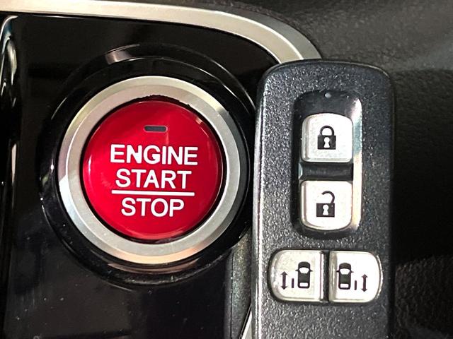 N-BOXカスタム G・ターボLパッケージ ナビ 両側電動スライド HIDヘッド クルーズコントロール バックカメラ ETC Bluetooth接続 CD オートエアコン オートライト スマートキー 盗難防止装置 横滑り防止装置 電動格納ミラー(25枚目)